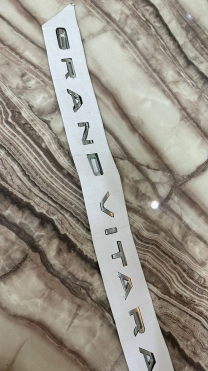 Grand Vitara Chrome Letter Emblem – 3D Car Badge Silver Sticker