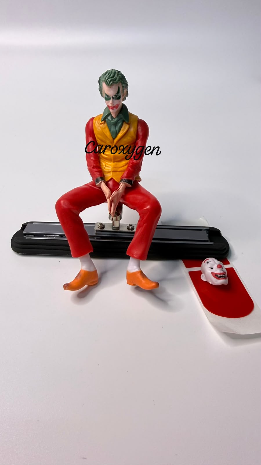 Caroxygen  Car Dashboard Sliding Joker  | Sitting Joker Figurine with Mask