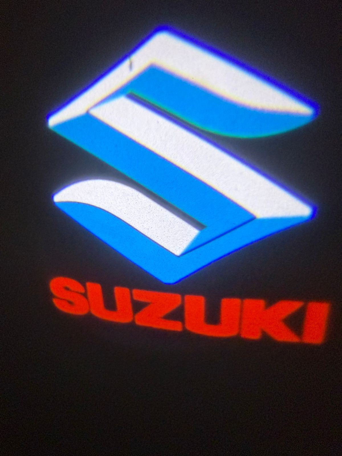 Maruti Suzuki Ghost Shadow Light  (Suzuki Logo ) Compatible With For Suzuki Baleno , Suzuki Brezza