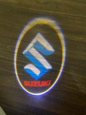 Maruti Suzuki Ghost Shadow Light  (Suzuki Logo ) Compatible With For Suzuki Baleno , Suzuki Brezza