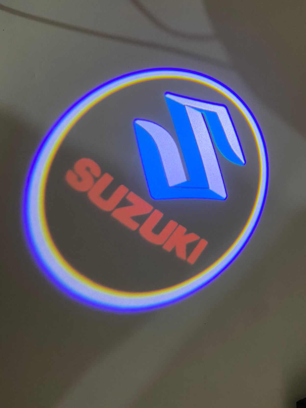 Maruti Suzuki Ghost Shadow Light  (Suzuki Logo ) Compatible With For Suzuki Baleno , Suzuki Brezza